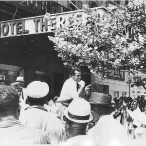 New York CORE chairman Marshall England in front of Teresa Hotel